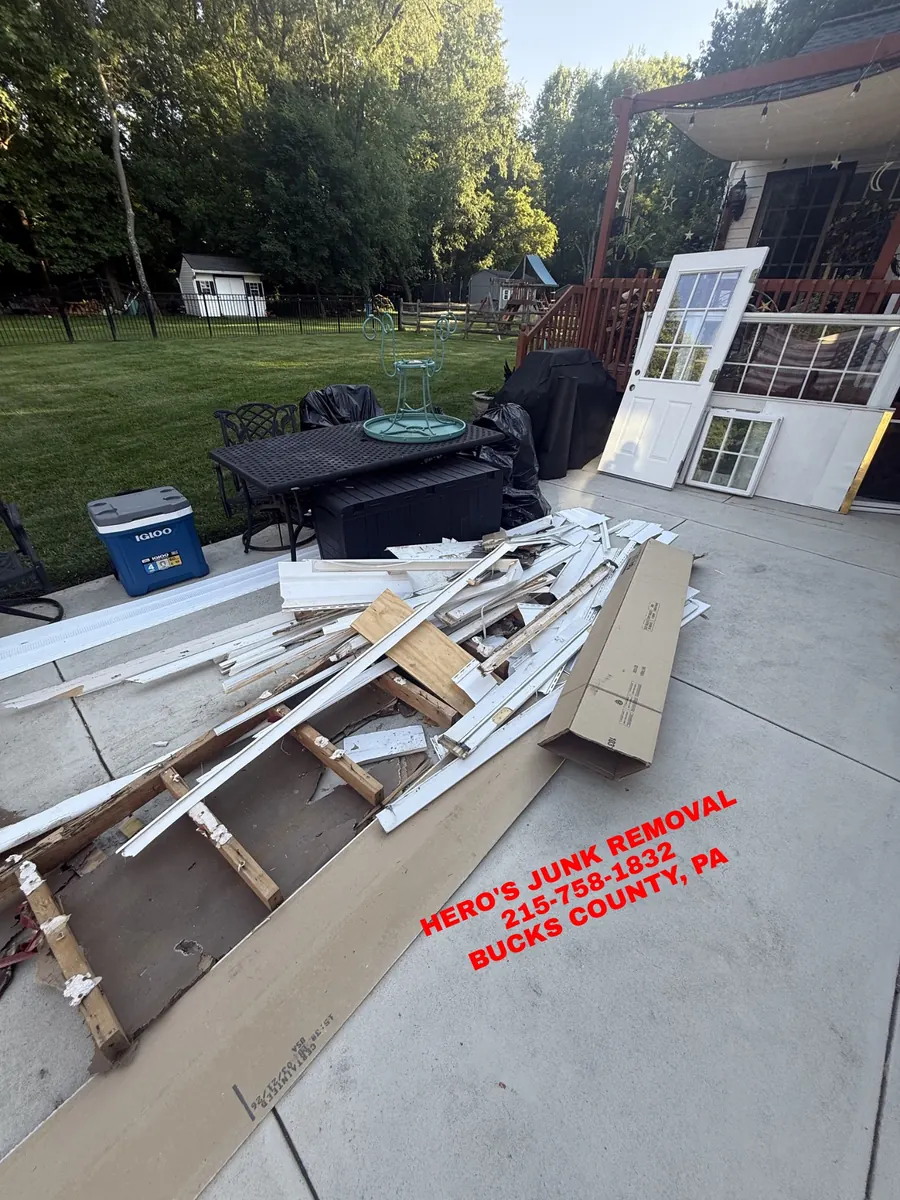 Loaded truck on a commercial junk-removal job by Hero's